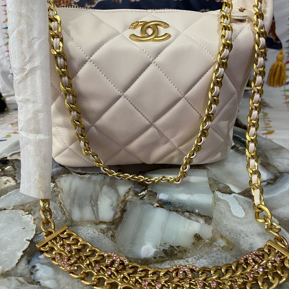 New VIP CC Cream Quilted Bag with Gold Chain Accent.